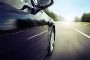a black car on the road